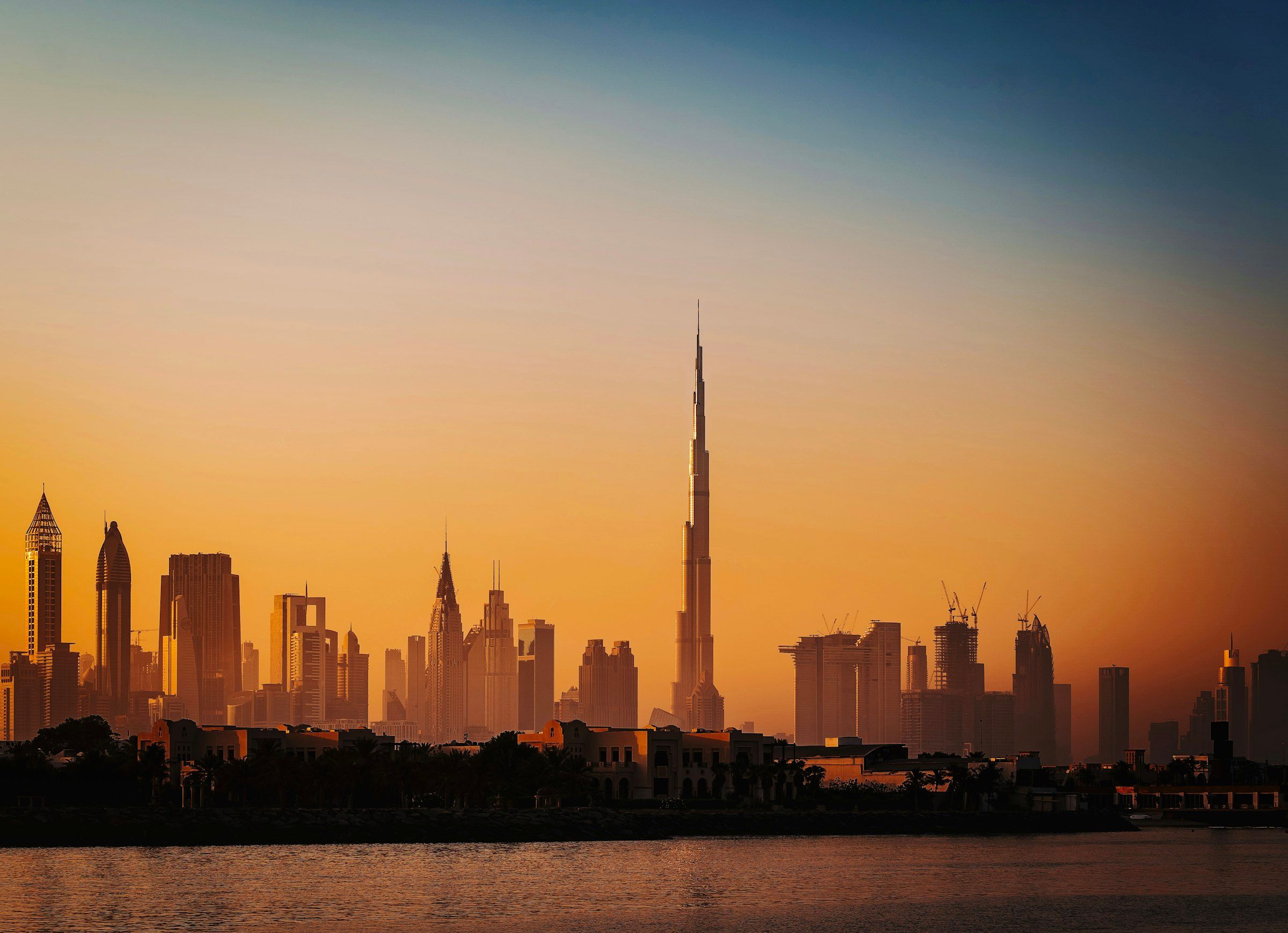 The Dubai skyline and Burj Khalifa at sunrise